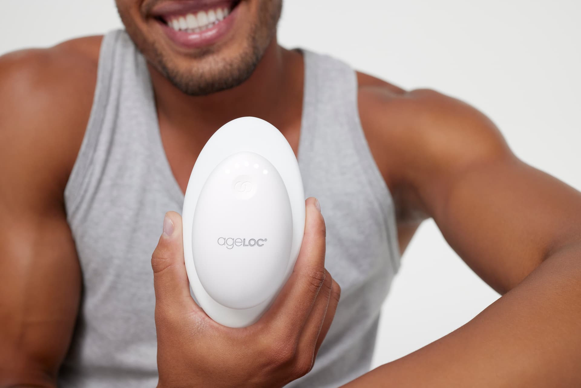 Person holding the RenuSpa iO device